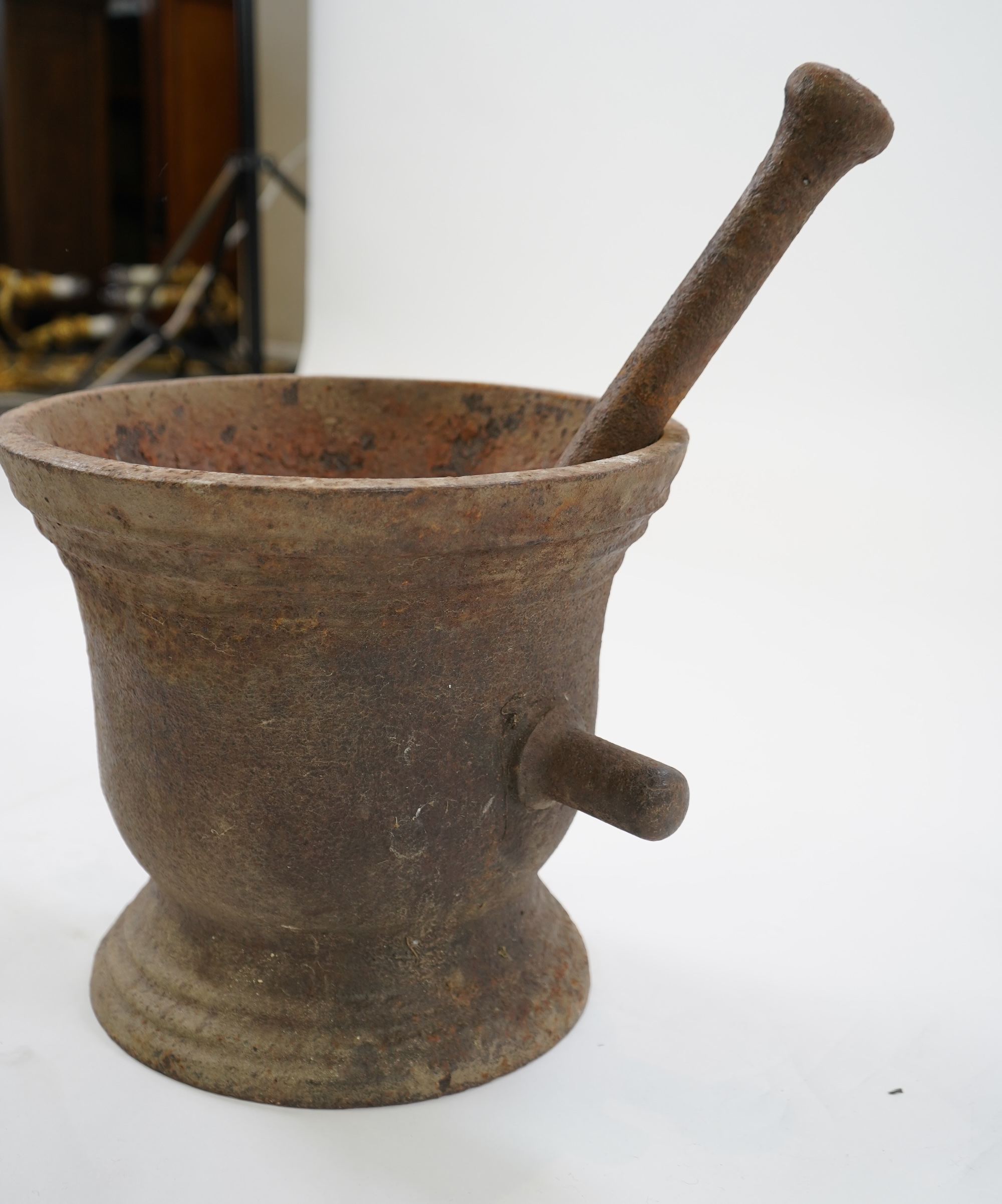 A large 18th/19thc cast iron mortar and pestle